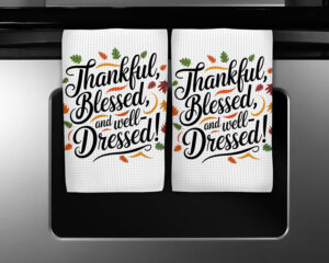 Funny Thanksgiving towel design with “Thankful, Blessed, and Well-Dressed” text and colorful fall leaves