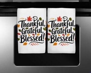 Sublimation towel design with the phrase “Thankful, Grateful, Blessed” in black script surrounded by colorful fall leaves.