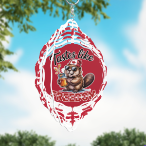 Funny Canadian beaver holding a maple drink with text "Tastes like Freedom" on a red and white wind spinner design