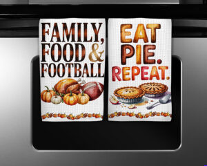 Two fall kitchen towel sublimation PNGs featuring turkey, football, pumpkins, pies, and a matching pumpkin border.