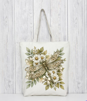 Moody sage dragonfly sublimation PNG design featuring daisy flowers bows leopard print wings and soft sage foliage on white shirt mockup